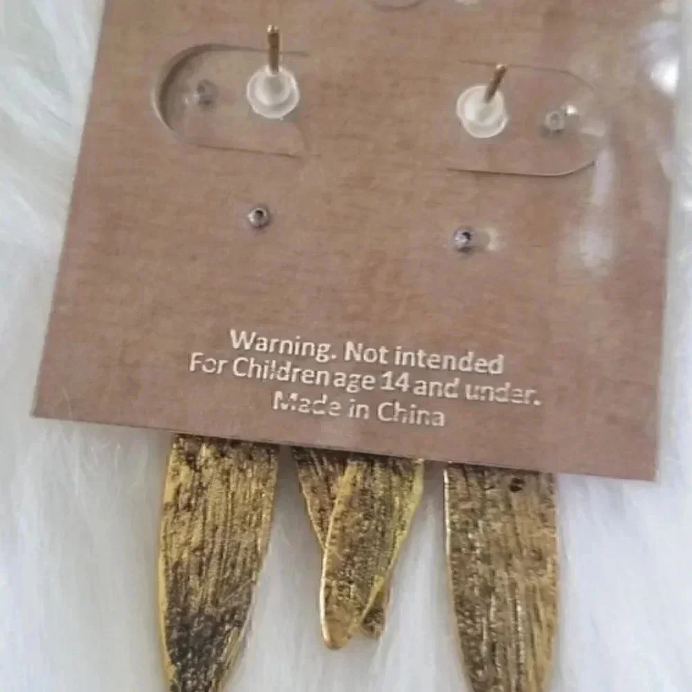 Gold toned rindstone feather earrings